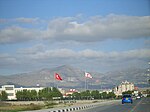 North Nicosia Turkish Cypriot and Turkish flags and Atatürk monument